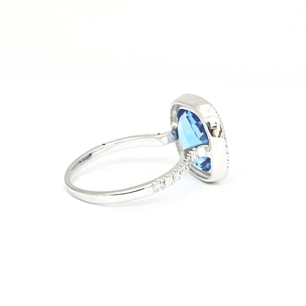 14 Karat White Gold Blue Topaz and Diamond Ring